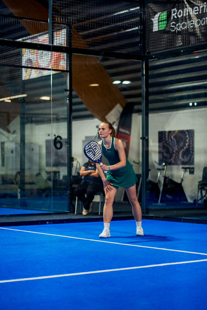 Woman playing padel in Dessard
